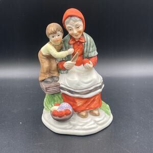 Vintage Figurine of Grandmother with Grandson Peeling Fruit